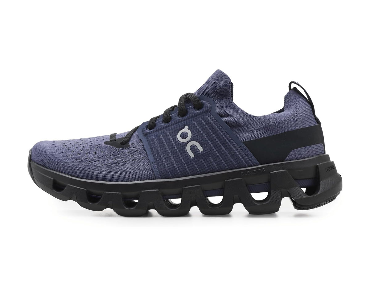 Blue running sneaker with On logo on side, black midsole, and treaded outsole