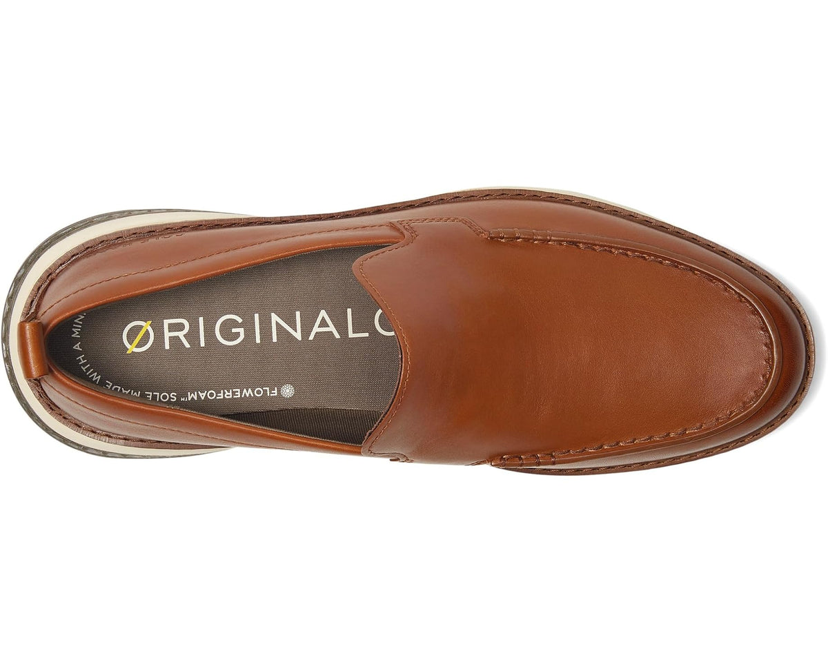 Men's brown slip-on loafer interior view with stitched upper and durable outsole