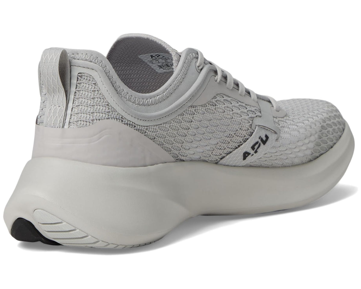 Light gray APL Euphoria sneakers with heel tab and cushioned midsole