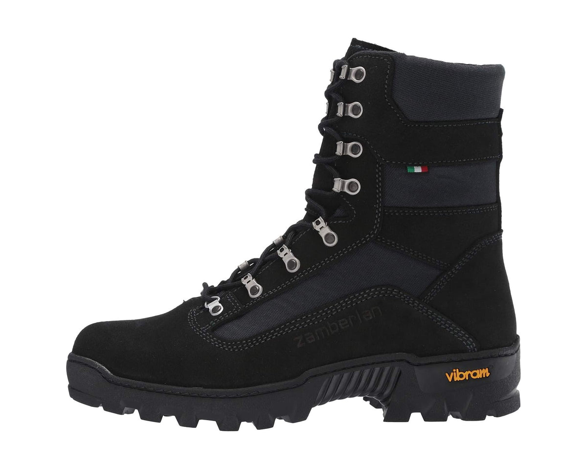 Black ankle boot with lace-up straps, pull tab, and Vibram logo on sole