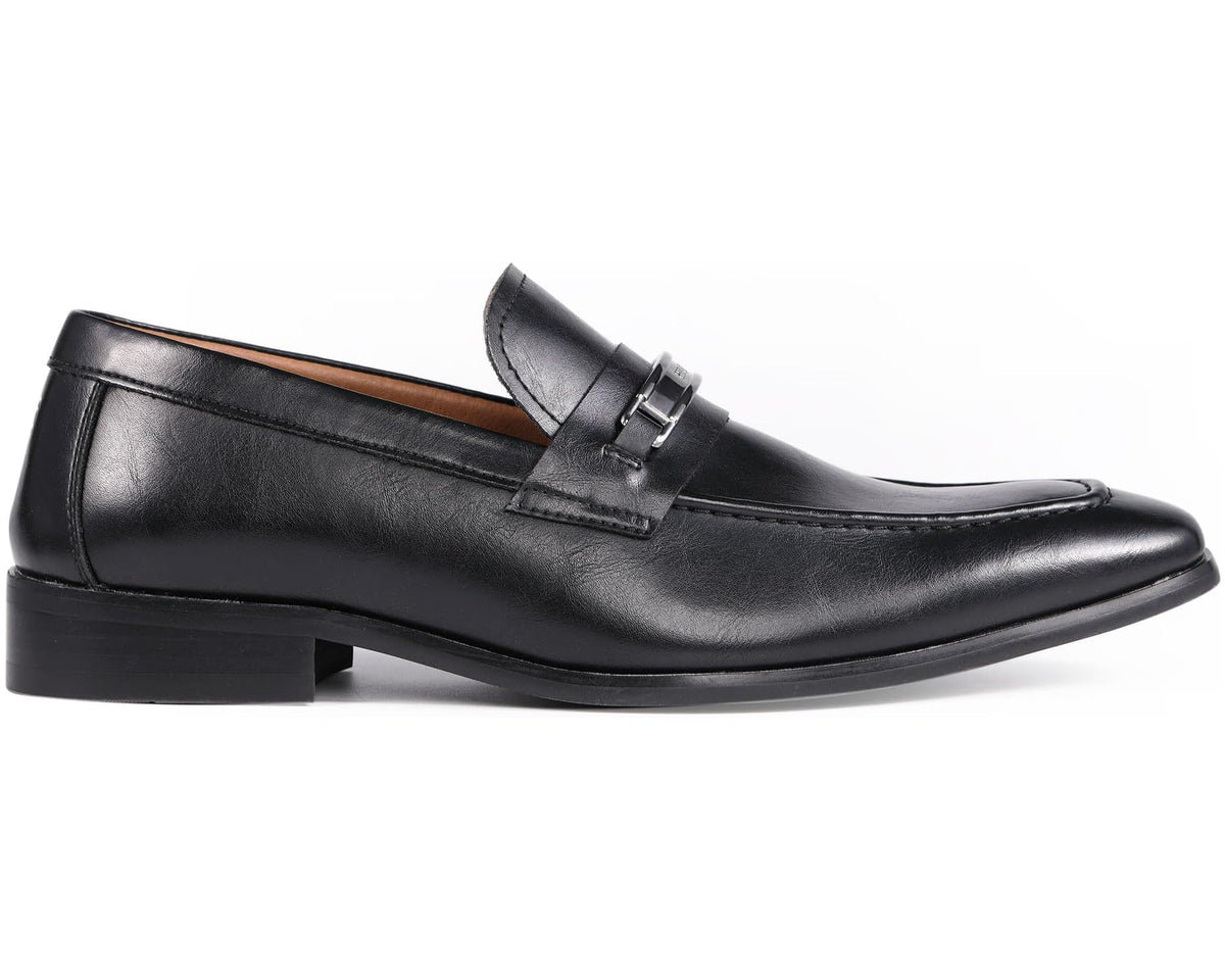Black leather penny loafer with metal strap buckle and low block heel