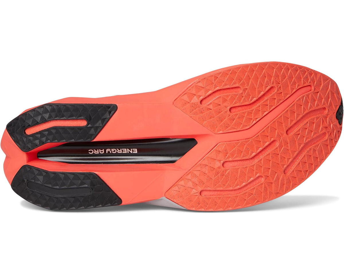 New Balance FuelCell trainer shoe outsole, orange tread with black heel pad detail
