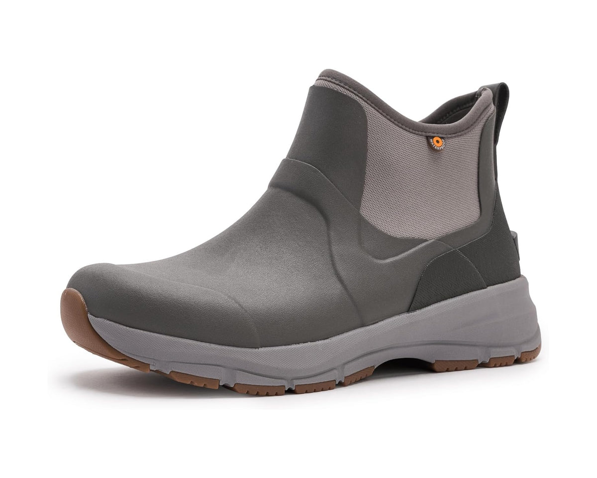 Gray chelsea boot with elastic side gore and cushioned collar, rubber lug outsole