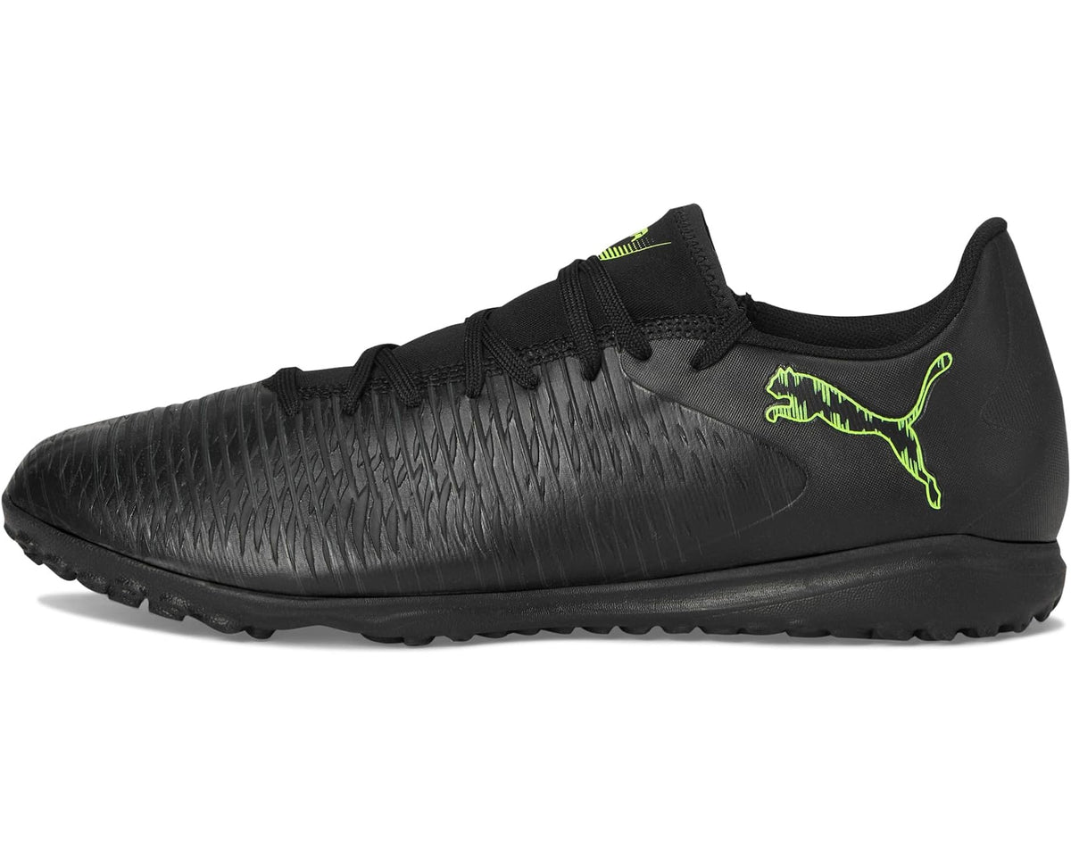 Men's PUMA turf trainer cleats, black textured upper with neon green side PUMA logo