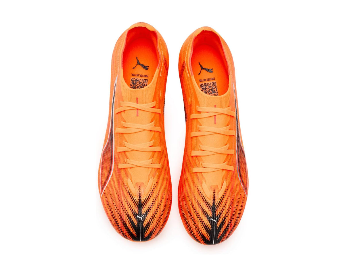 PUMA men's soccer cleats, orange uppers with lace-up front and PUMA logo
