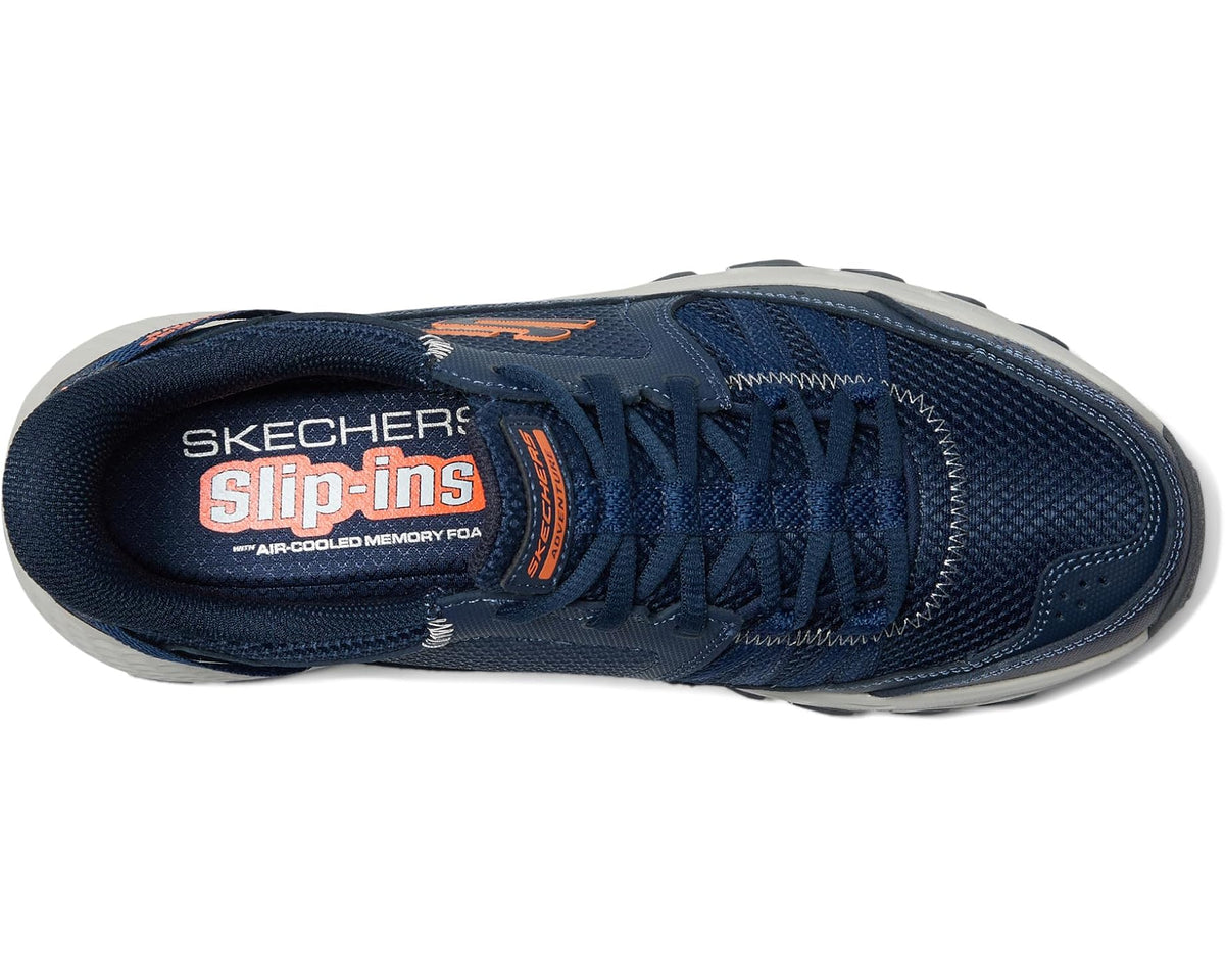 Navy SKECHERS Slip-ins sneaker showing laces, padded collar, and cushioned insole