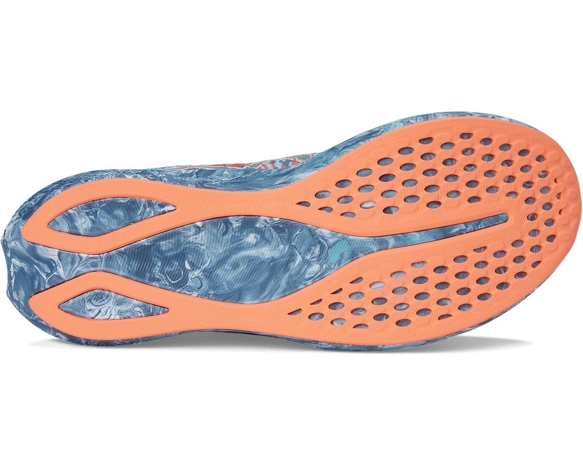 Men's ASICS running shoe outsole with orange rubber pods and blue textured grip