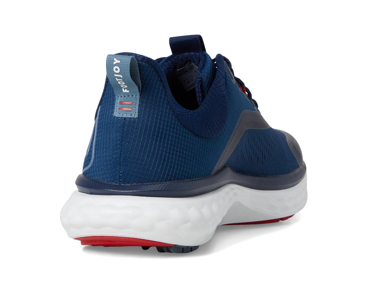 Women's FootJoy athletic sneaker heel view, navy knit with red accent on outsole