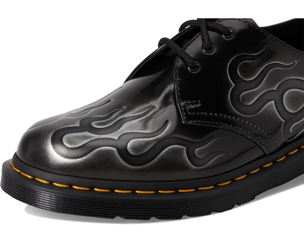 Dr. Martens 1461 Inferno lace-up shoes, close-up black upper with silver flame emboss