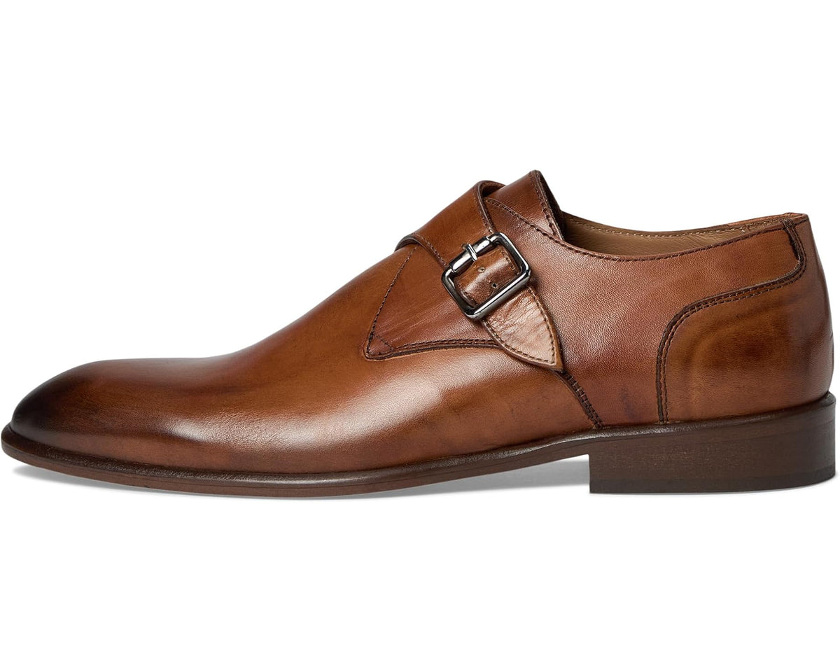 Men's brown leather monk strap dress shoe with buckle and stitched panels