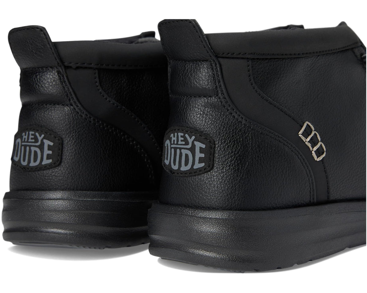 Men's black mid-top boots heel and side view with Hey Dude logo and metal buckle
