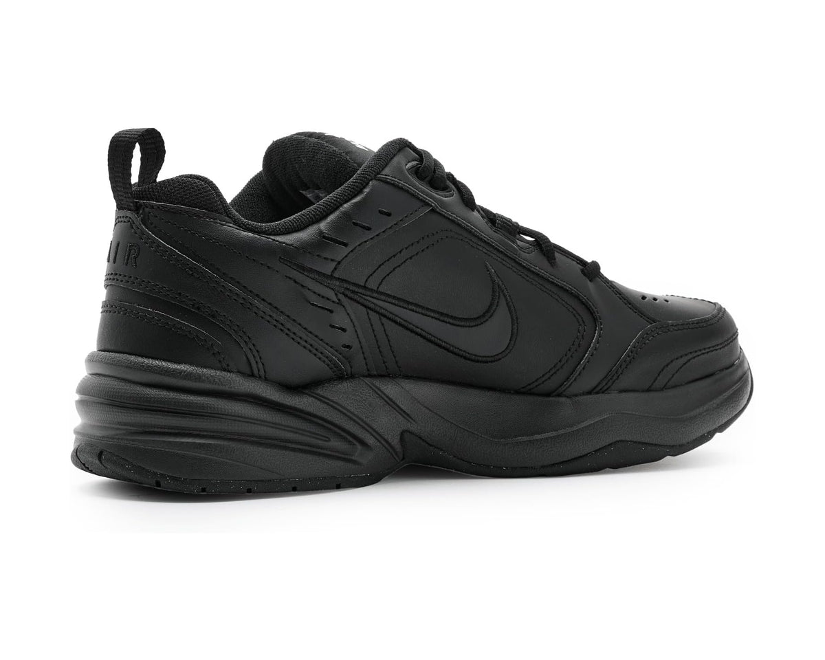Black Nike lace-up running shoe with side swoosh and padded collar.