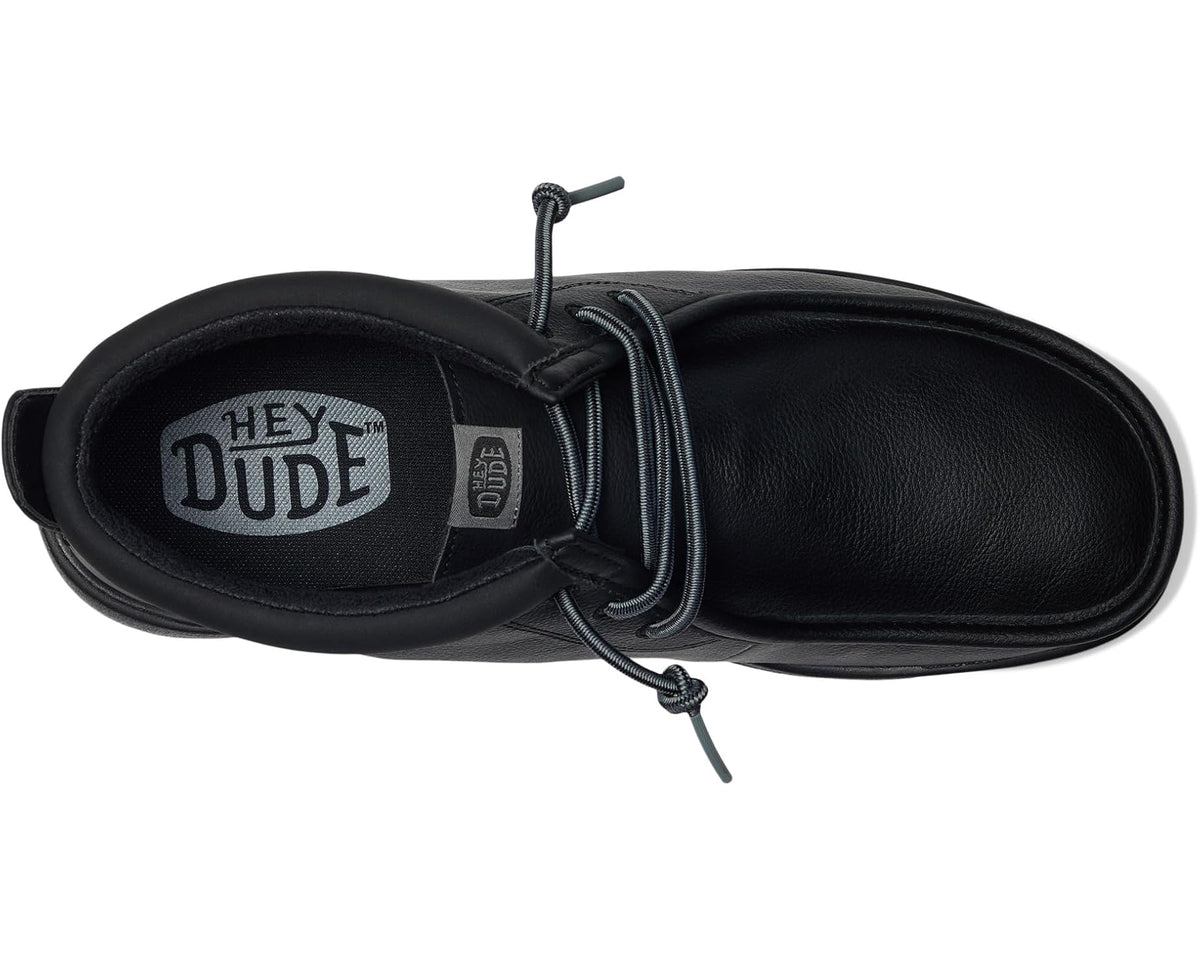 Men's black mid-top boot interior lining with Hey Dude logo and lace-up tongue