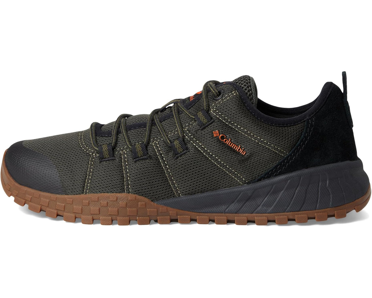 Men's low-top hiking shoe in olive and black with lace-up design and brown outsole