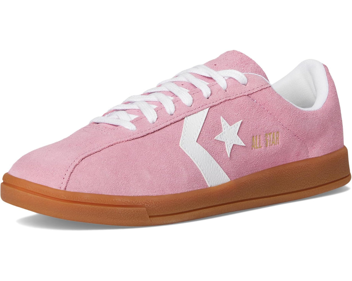 Pink suede low-top lace-up sneaker with white star and gum rubber sole