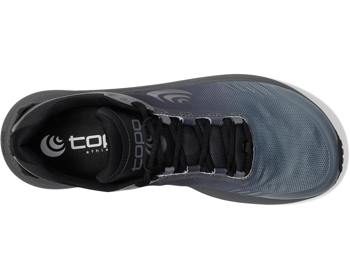 Men's Topo athletic trail running shoe, side view with black laces and padded collar