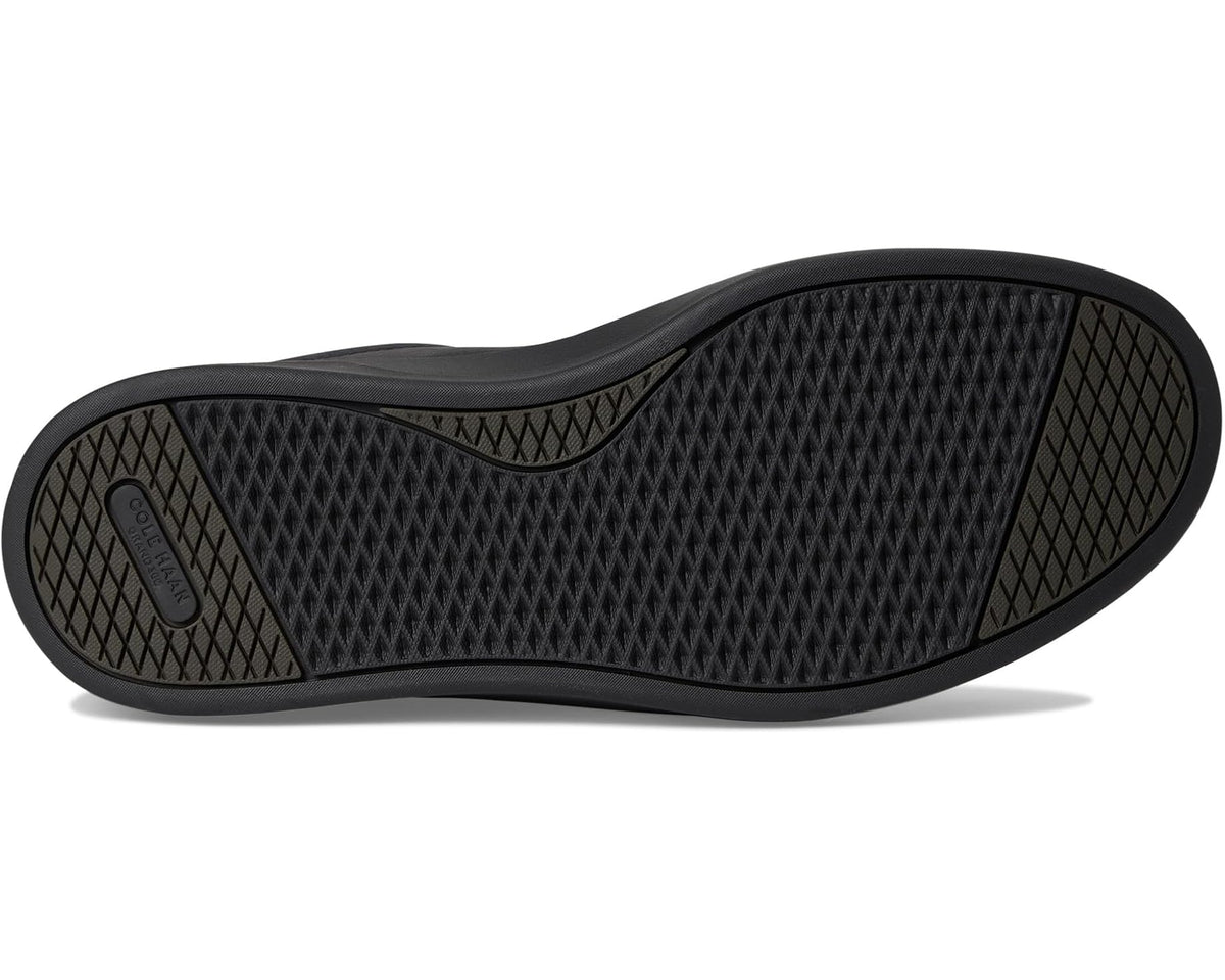 Black rubber outsole with textured diamond tread pattern