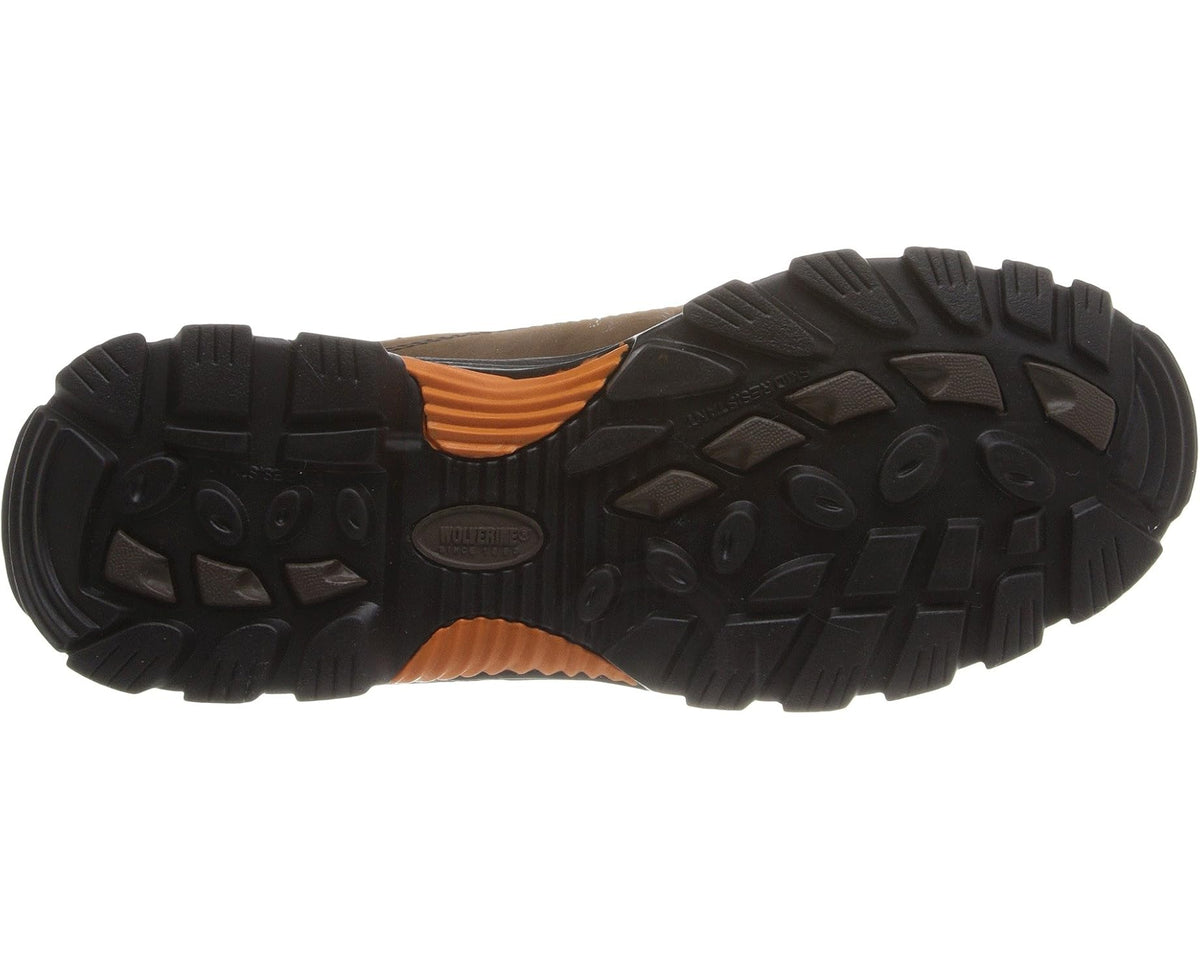 Men's hiker boot outsole with black tread and orange midsole accent