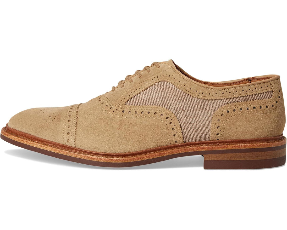 Men's bone suede oxford shoes with lace-up front, brogue detailing, and low heel