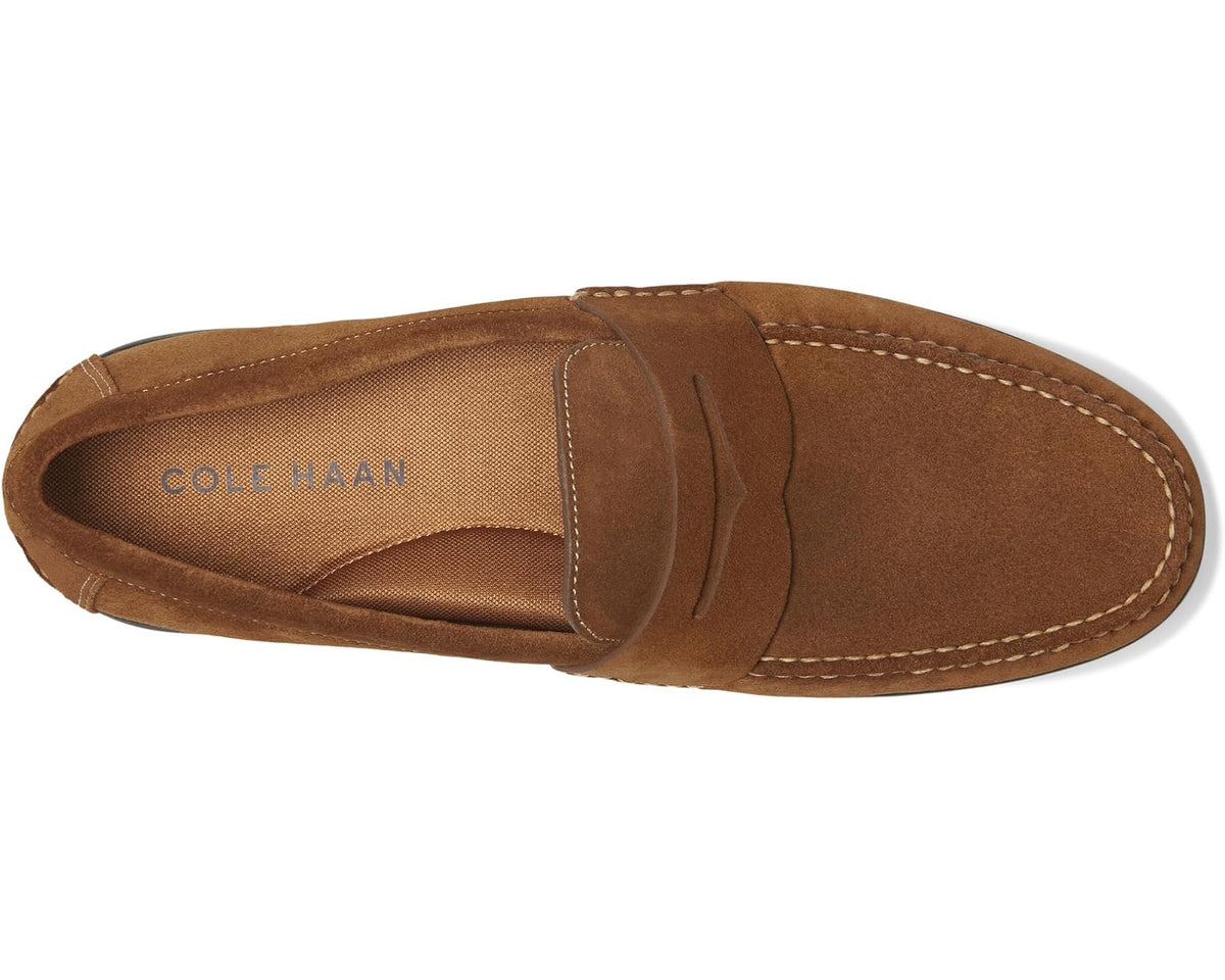 Men's suede penny loafer, brown, interior lining with Cole Haan logo and moc seams