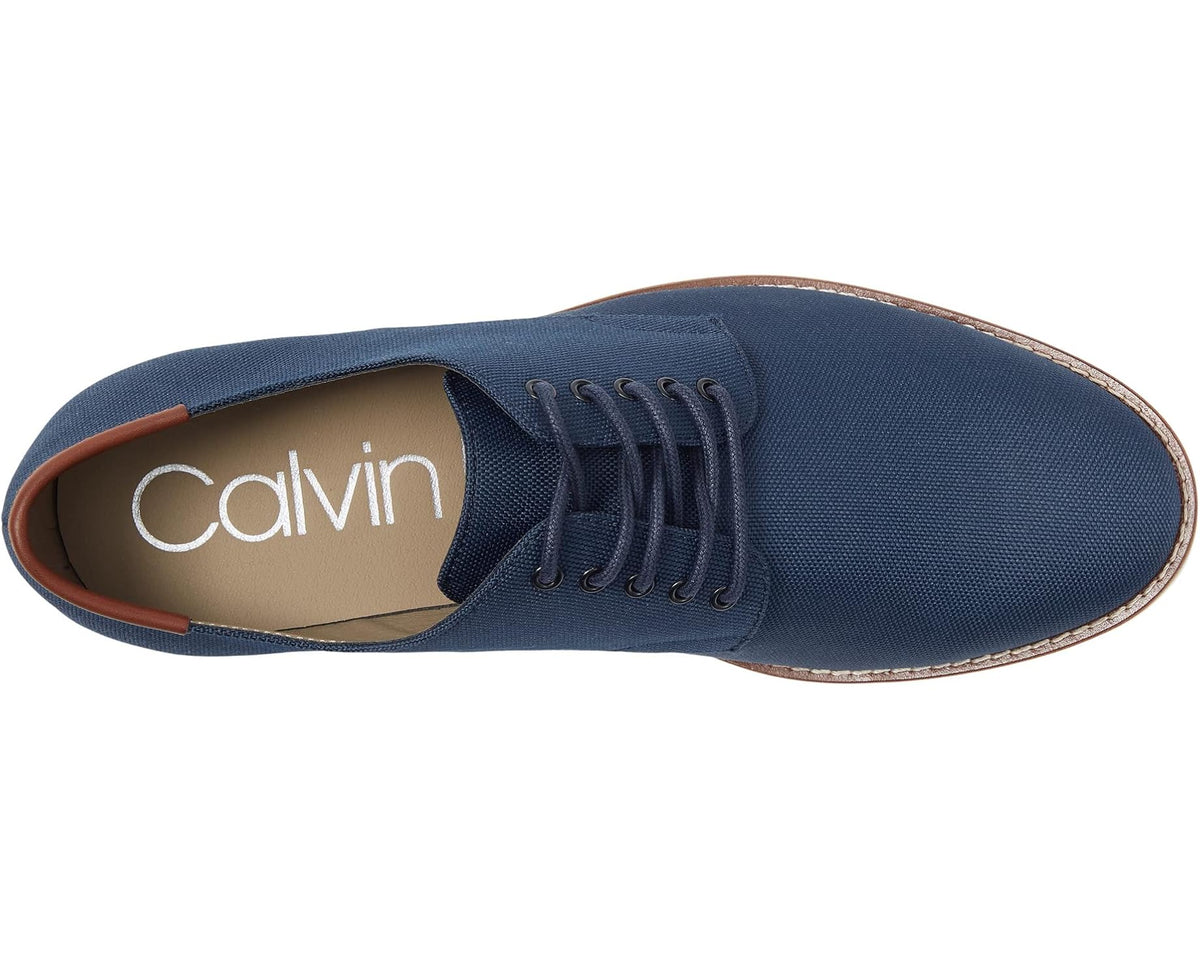 Men's navy lace-up oxford shoe showing navy upper, laces, and inner logo