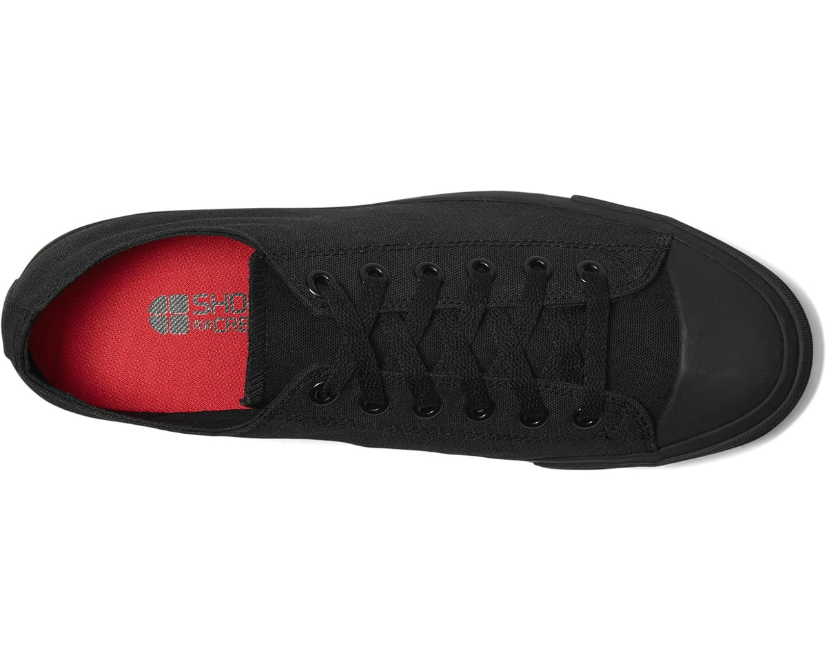 Unisex black canvas low-top shoes with red interior lining and lace-up