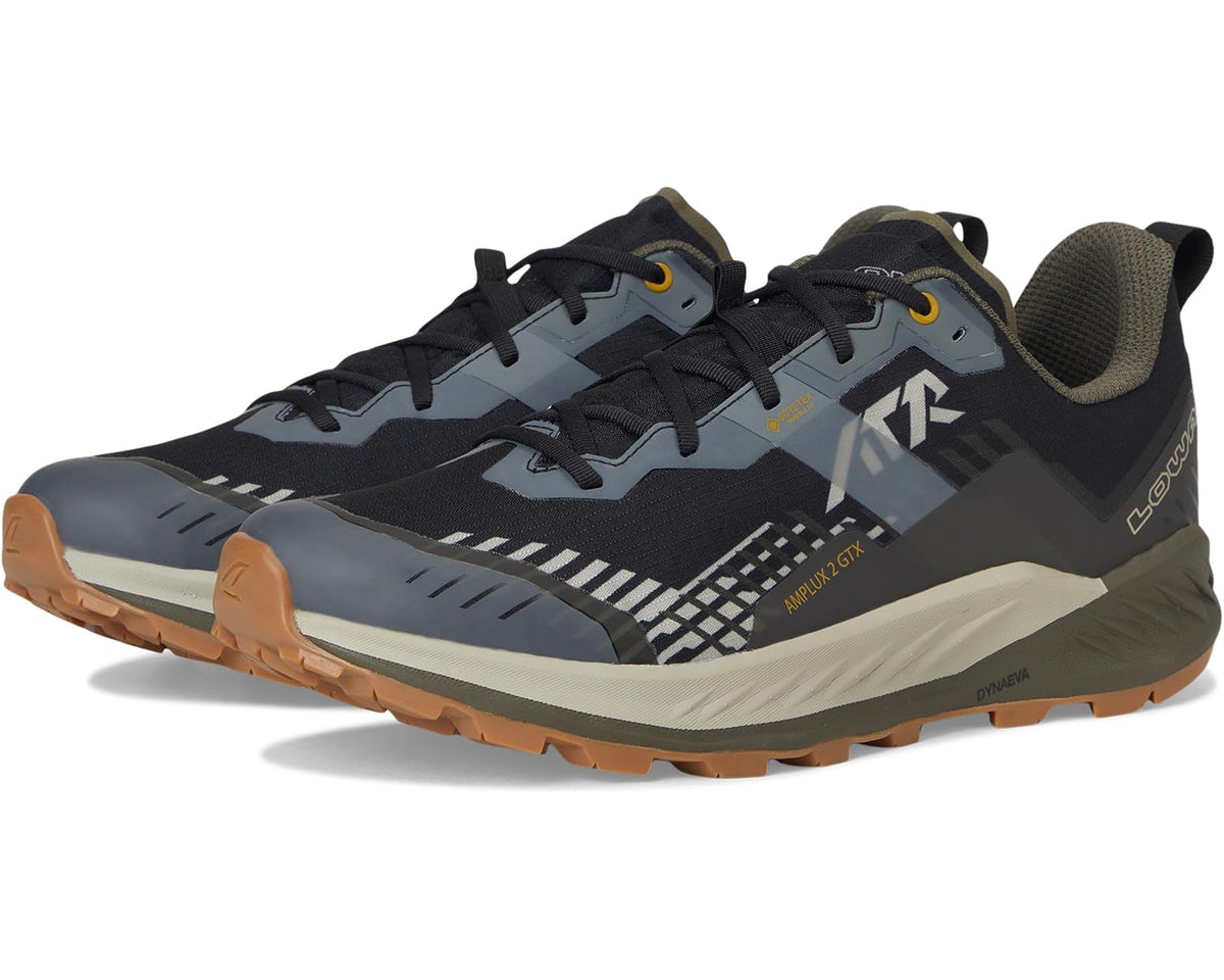 Men's trail running shoe, dark navy/olive with black laces and orange-brown outsole