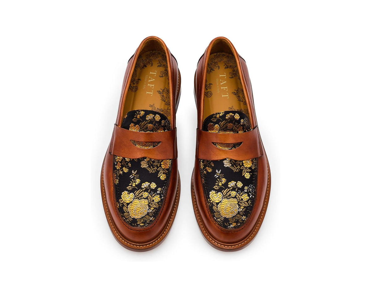 Pair of tan loafers with floral brocade lining and stitched apron front