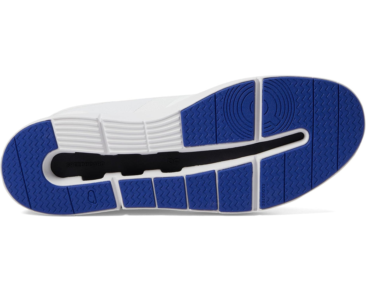 Men's white sneaker outsole with blue traction pods and black detail