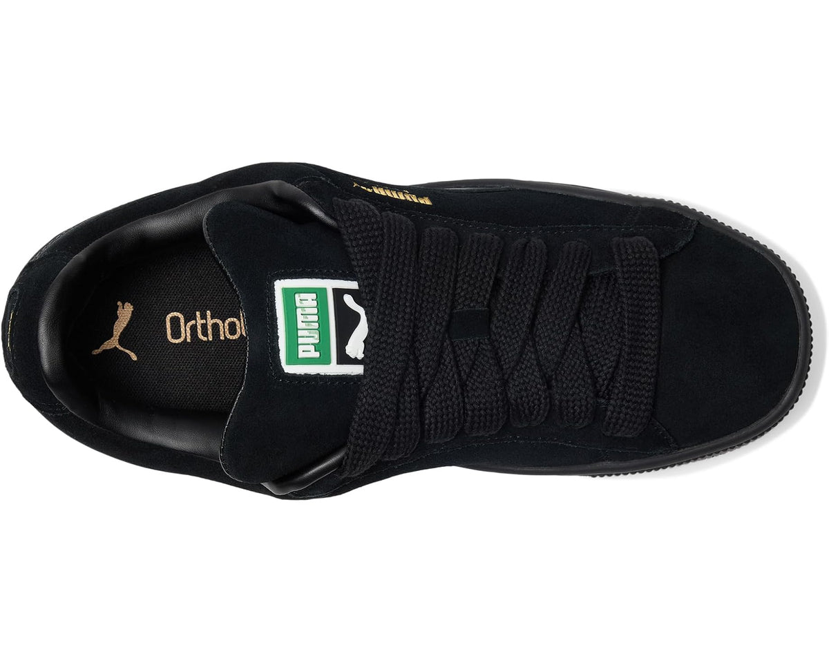 Black lace-up sneakers with PUMA and OrthoLite logo on the tongue lining.
