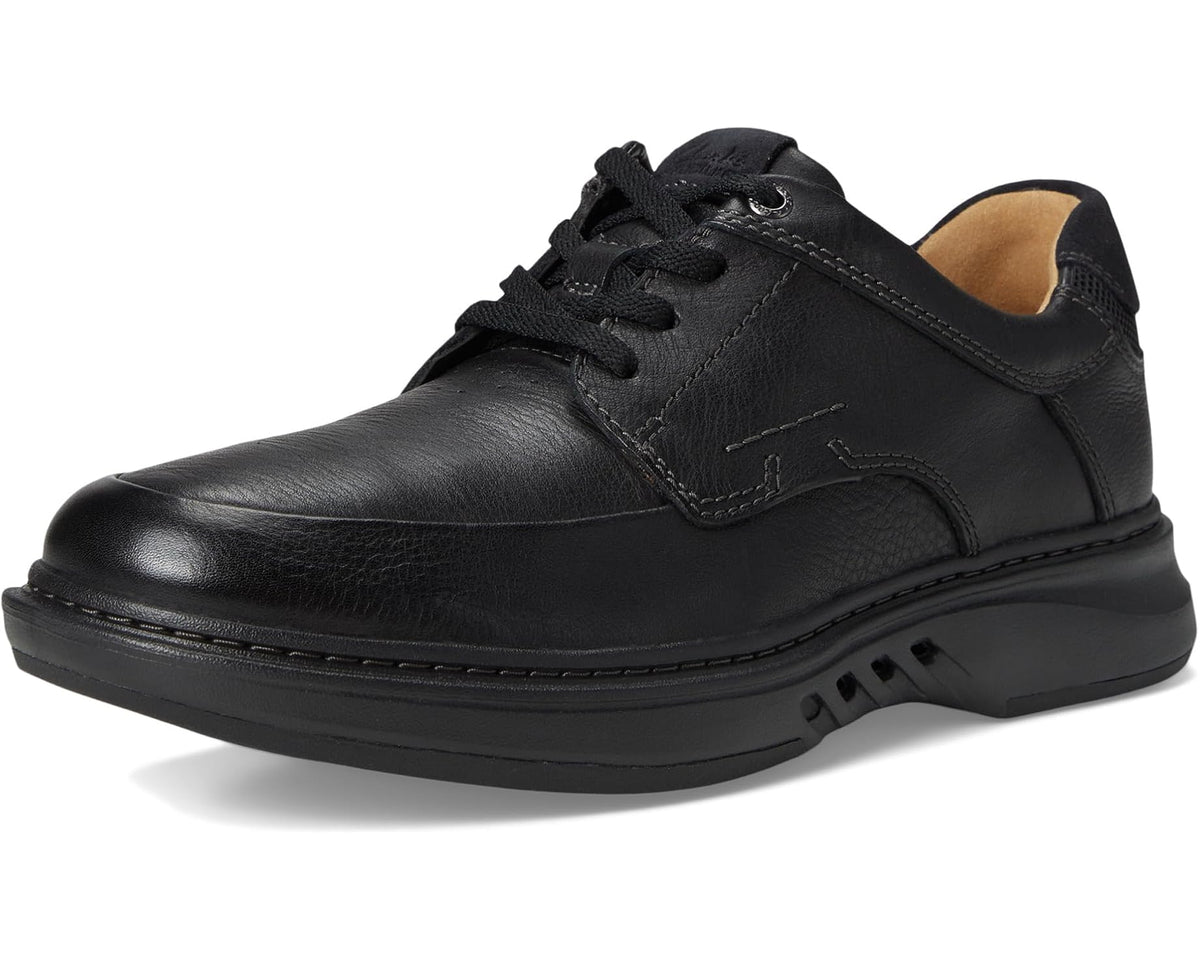 Men's black leather lace-up Oxford shoe, front 3/4 view, low-profile sole.