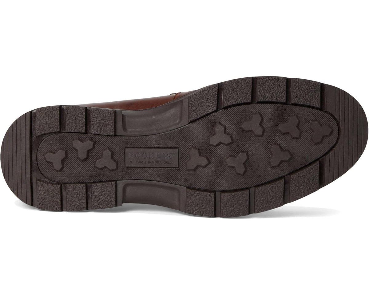 Mahogany loafer outsole with dark tread and star-pattern grip