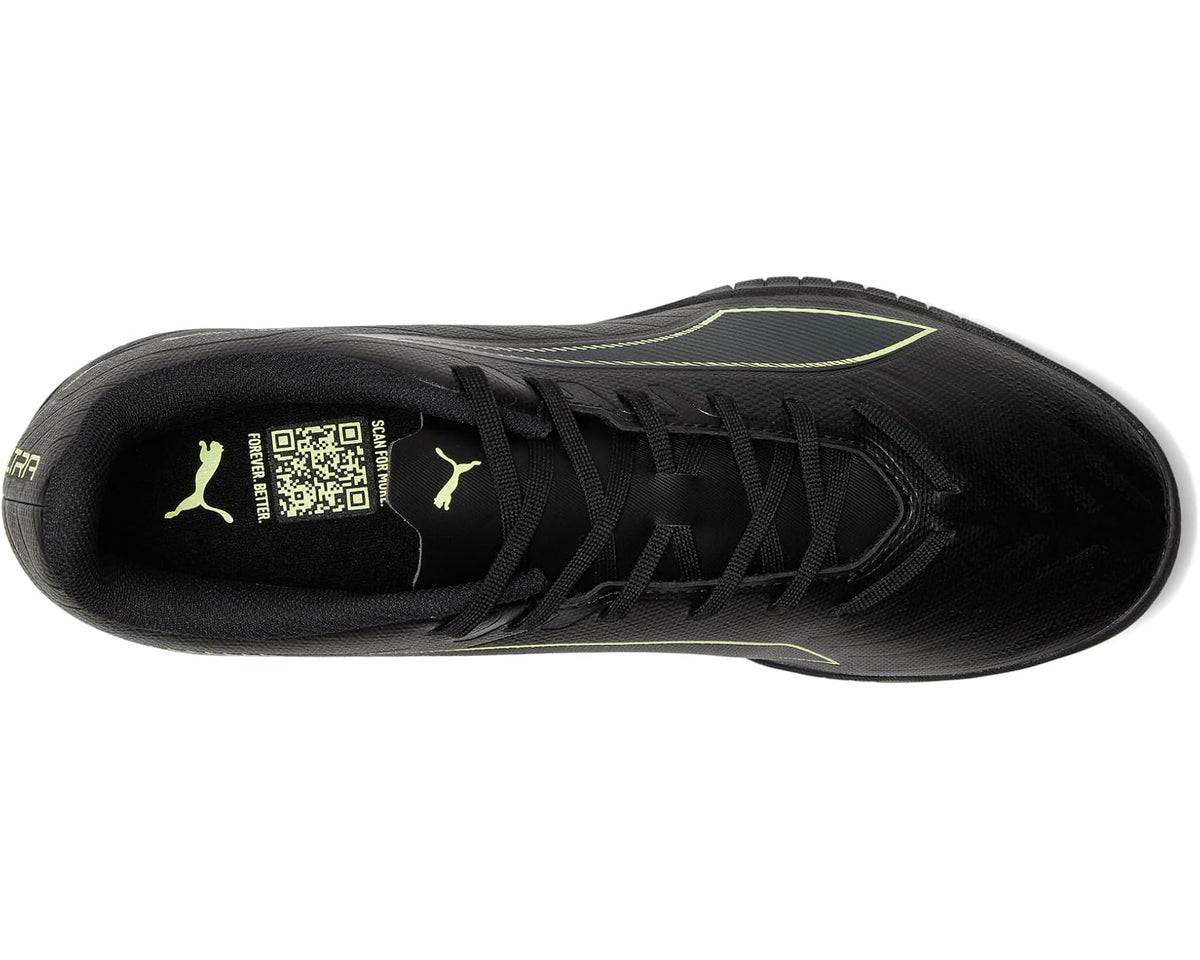 Black PUMA turf soccer cleats side view with neon green outline and laces