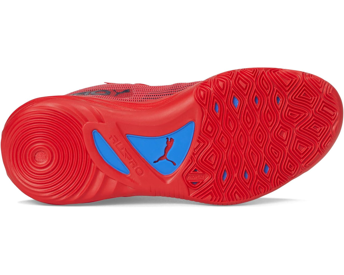 Red outsole with blue PUMA accents on a men’s lace-up performance shoe