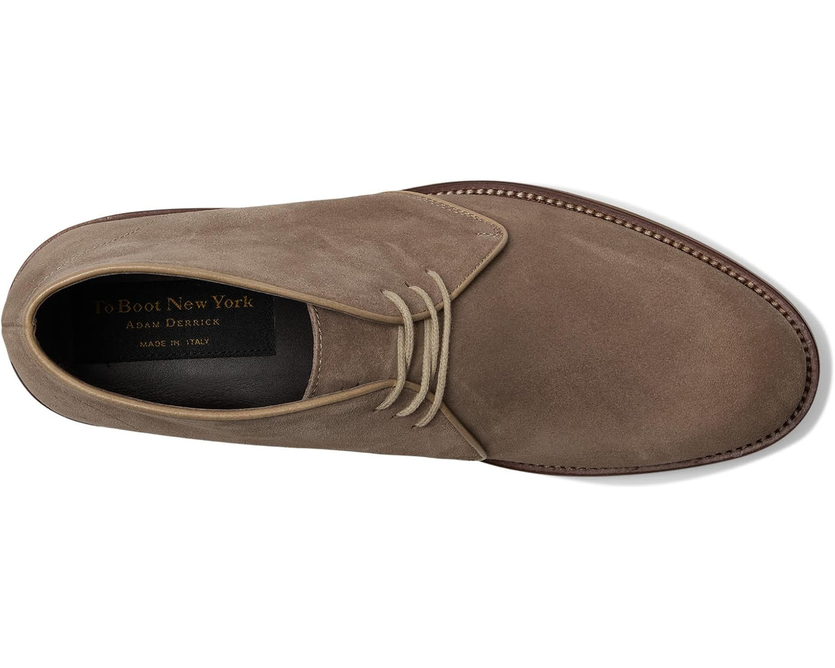 Slate-brown suede chukka boot with lace-up closure and fabric-lined interior