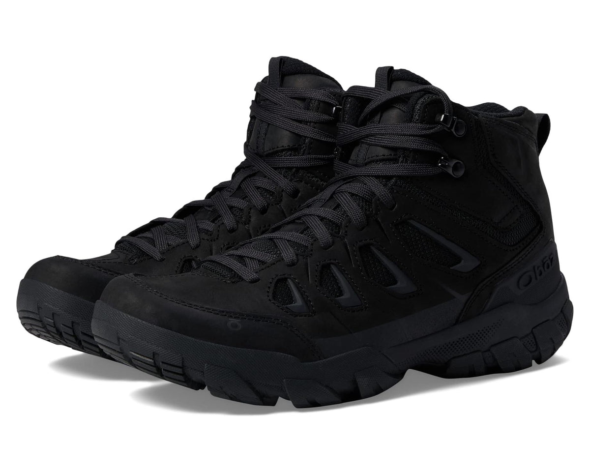 Black mid-top hiking boot with lace-up closure and rugged tread outsole