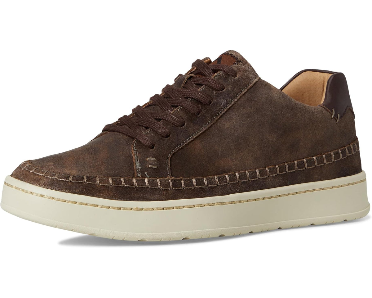 Men's dark brown suede lace-up sneaker profile with white midsole and side logo