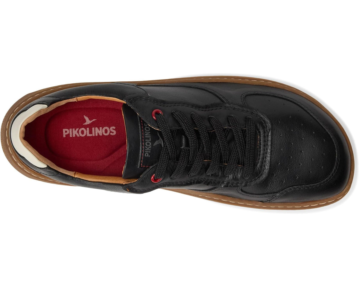 Black unisex sneaker interior with red PIKOLINOS lining and lace-up tongue