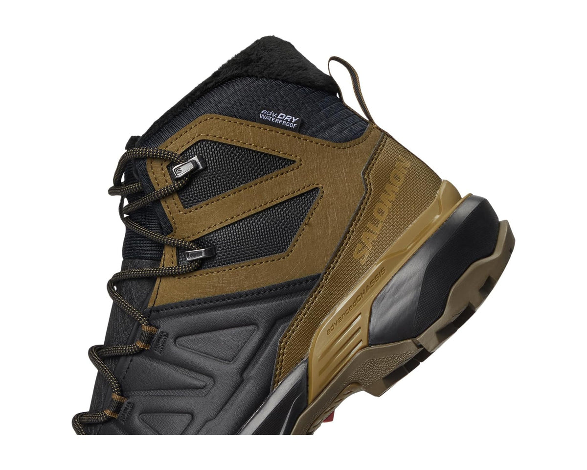 Salomon men\u2019s snow hiking boot, close-up of laces, side panels, and textured sole