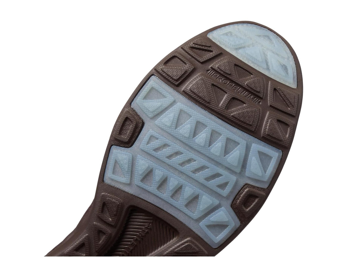Men's dark brown outsole with light blue traction pods and tread pattern