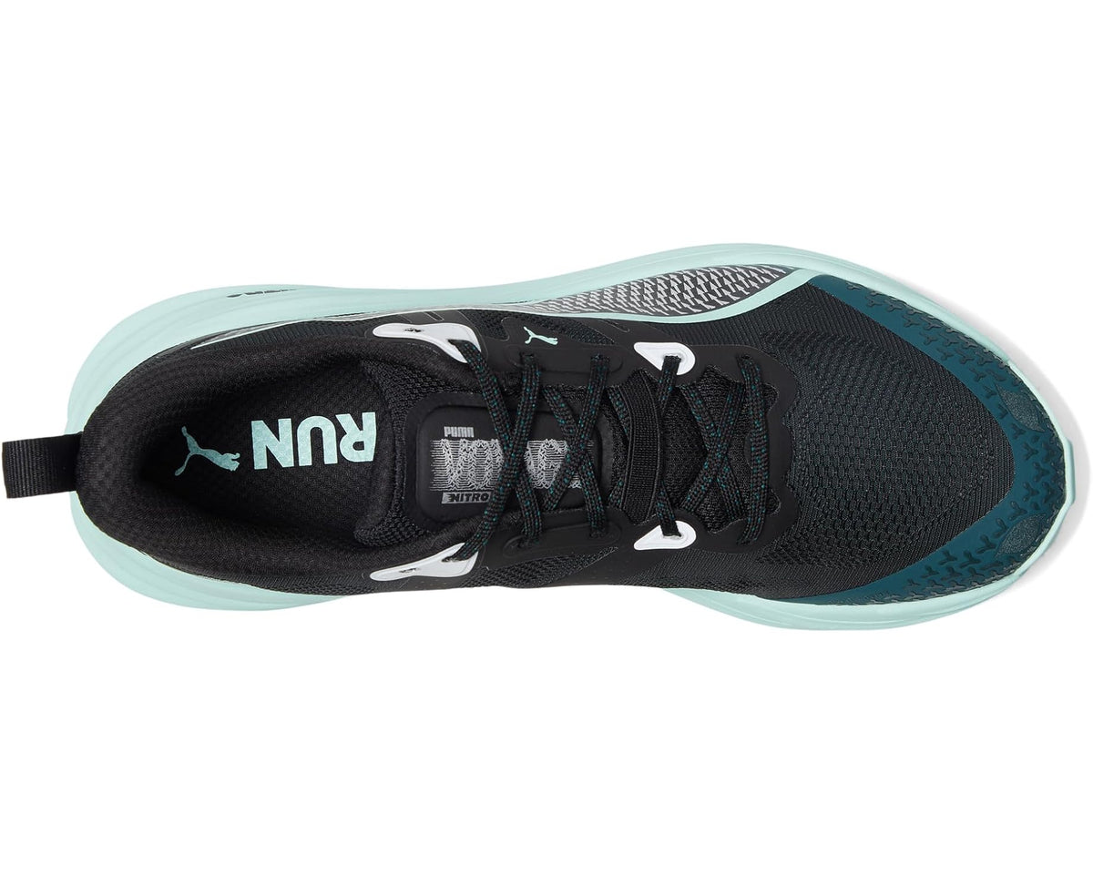 Men's trail running shoe top view: black upper, mint edge, laces, PUMA logo