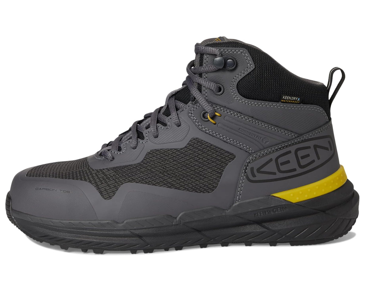 High-top waterproof work boot in dark gray with black overlays and yellow heel stripe.
