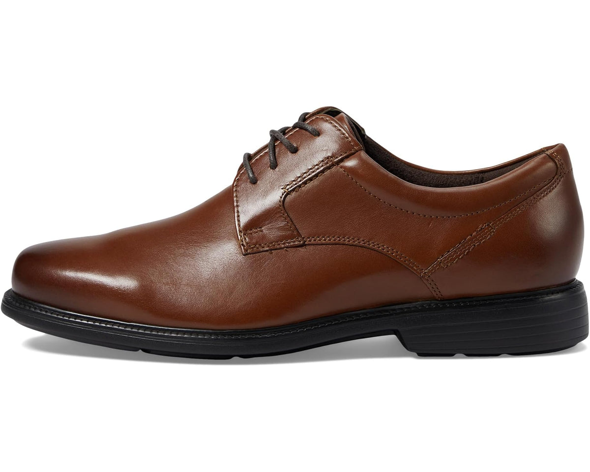 British tan lace-up Oxford dress shoe with plain toe and stitched details