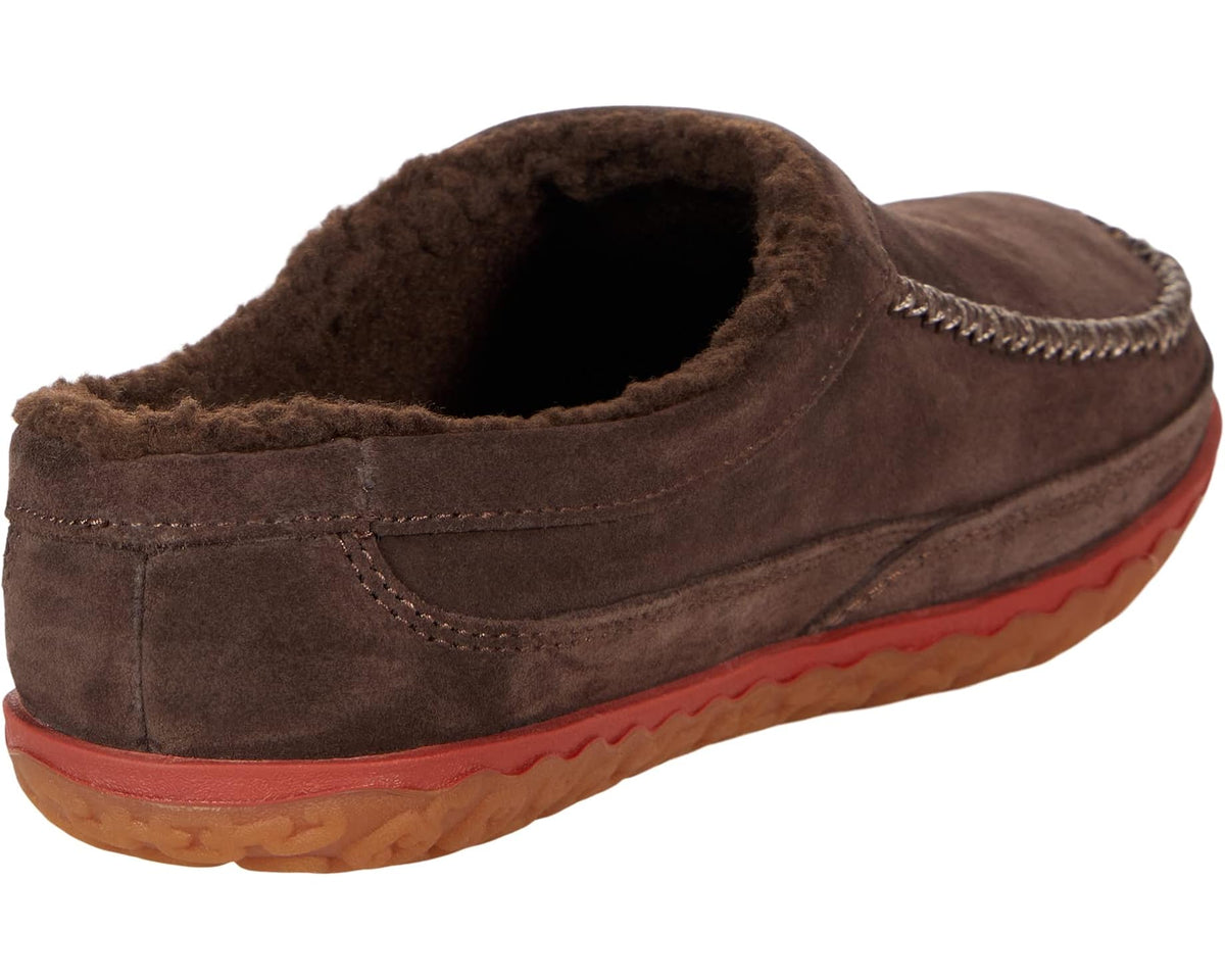 Brown suede slipper scuff with open interior, shearling lining, and patterned red sole