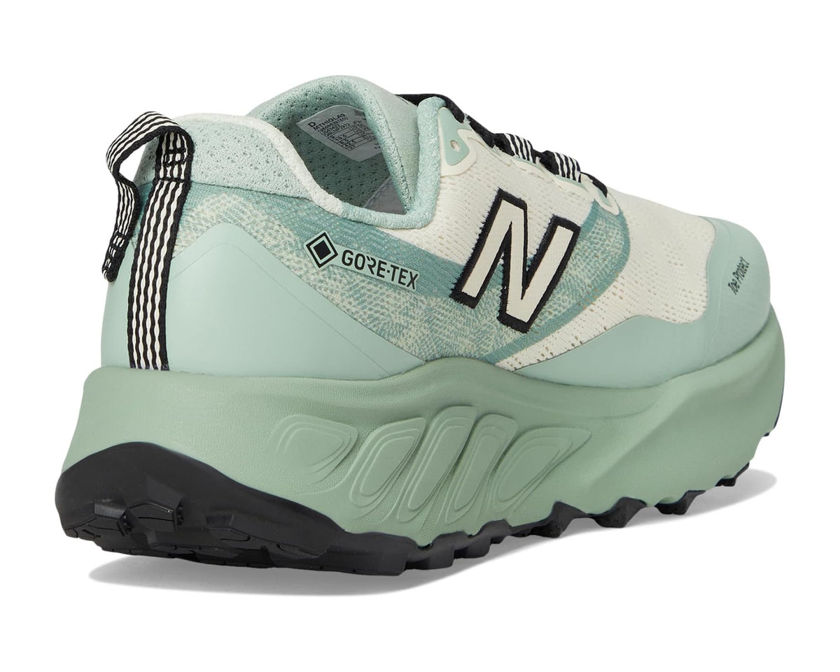 Men's New Balance trail shoes with GORE-TEX label, mint upper and black outsole
