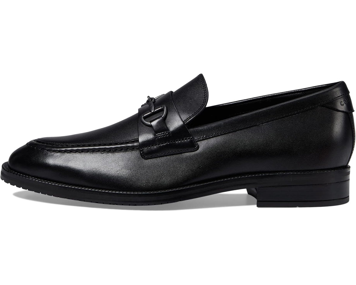 Black leather horsebit loafer with strap detail and low block heel