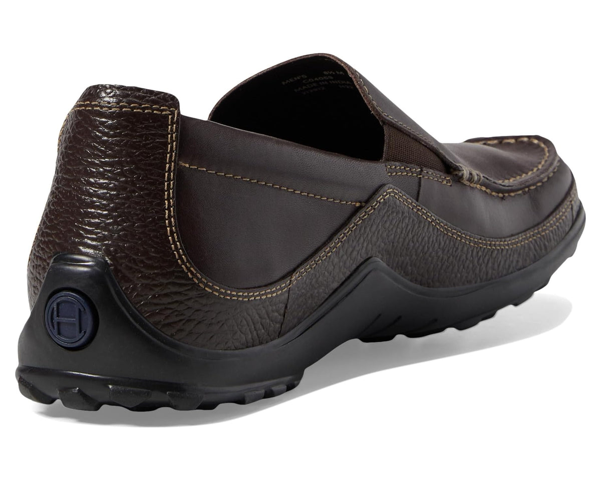 Dark brown leather loafer with cushioned collar, stitched seams, and blue heel emblem