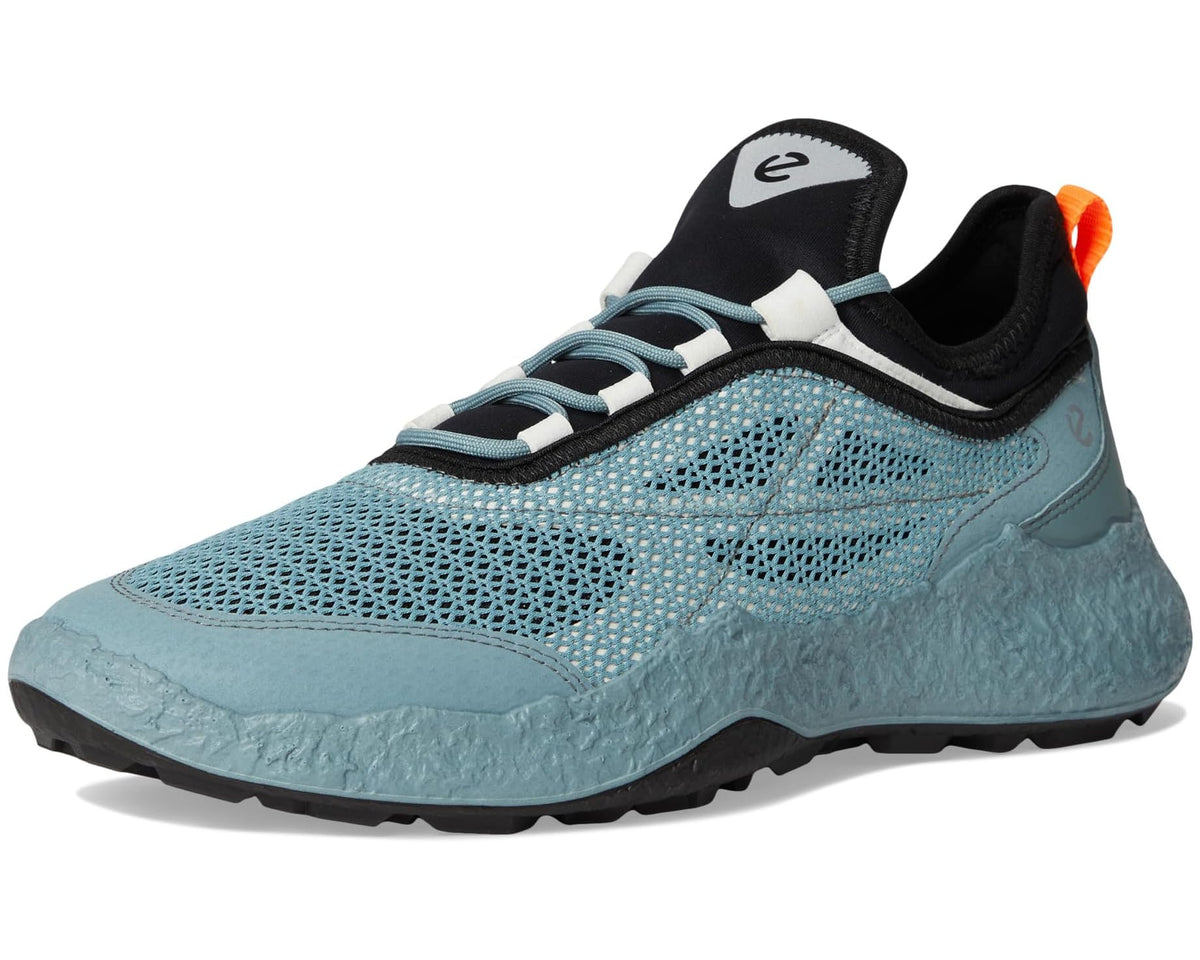 Sky-blue golf shoe with black padded collar, teal lace-up, and grippy outsole