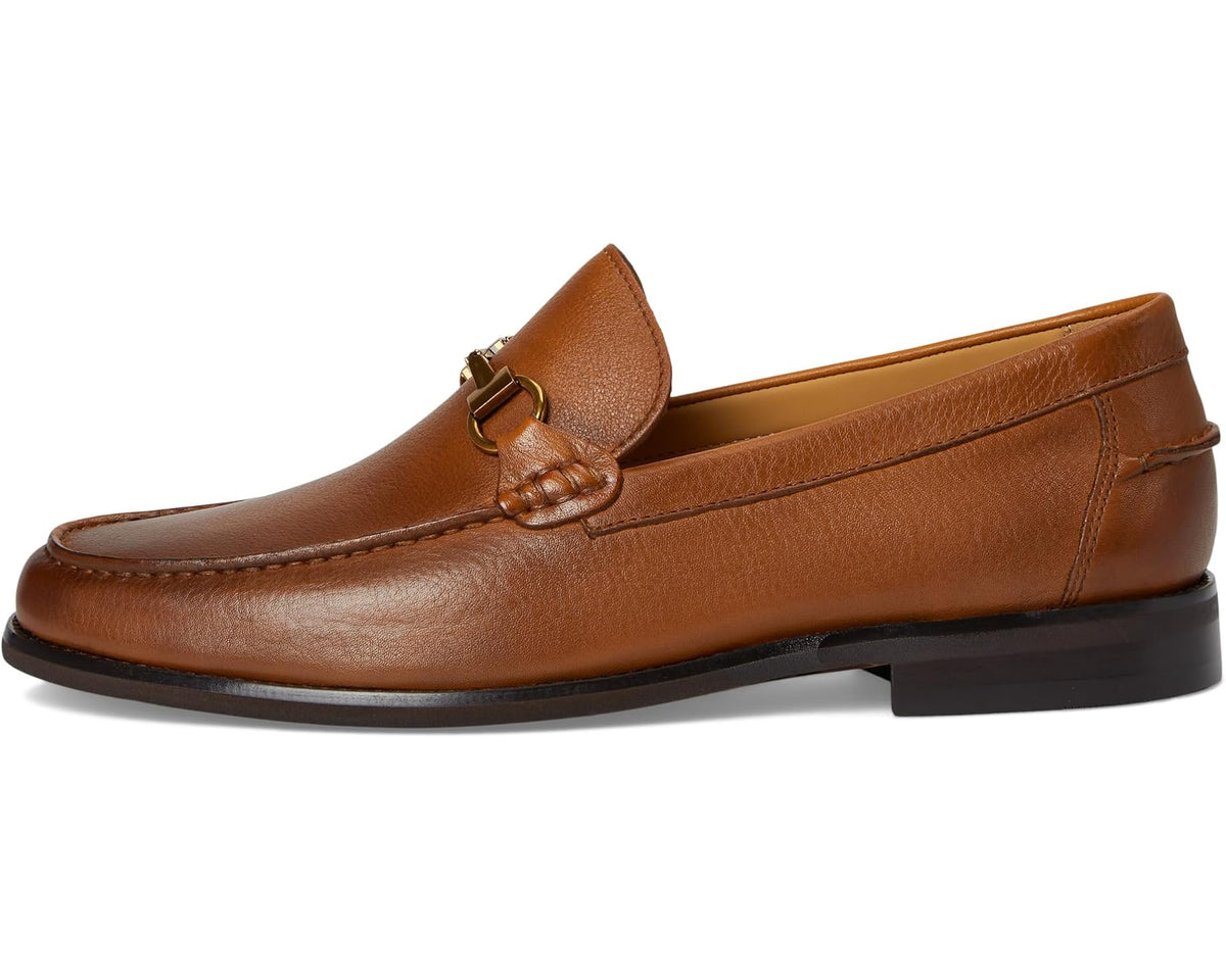 Tan leather slip-on loafer with gold buckle bit ornament