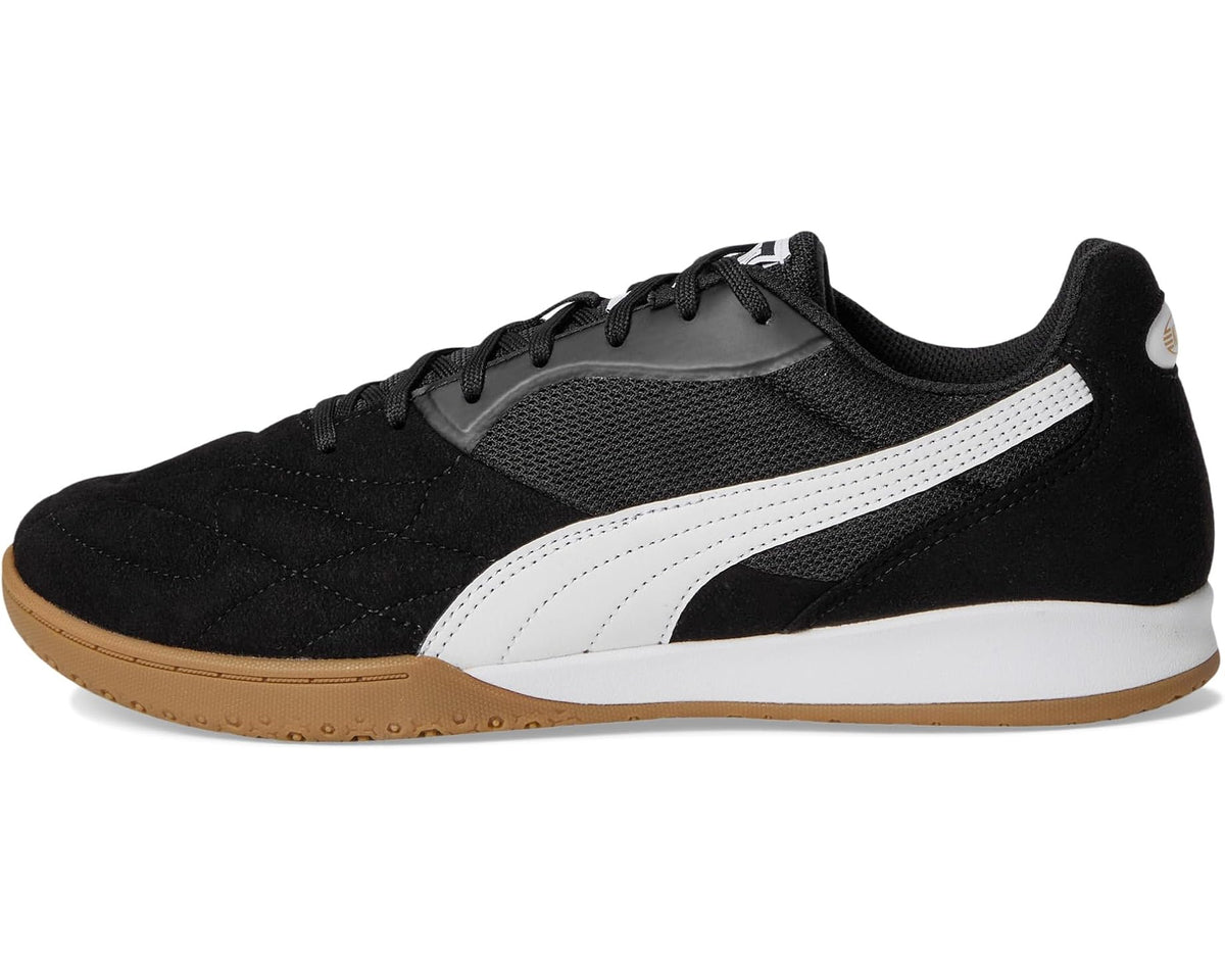Men's indoor soccer trainer shoes, black suede-look upper with white Puma stripe
